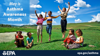 Image of children playing in a green field