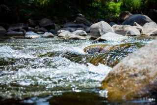 Water flowing over rocks in stream