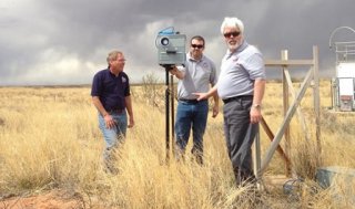 Image of people doing radiation monitoring in a field