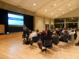 A person giving a presentation to a group of people.