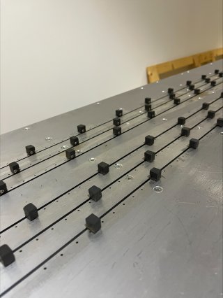 : the highway model with simulated cars (black squares) and holes for emissions