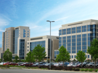 Large office buildings and a parking lot.