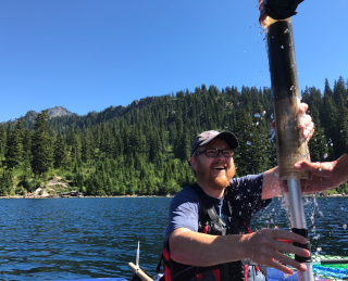 Man holding sediment sample