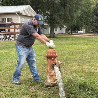 An EPA Region 7 scientist assists with water system flushing at the Santee Sioux Nation in Niobrara, Nebraska.