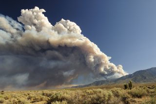 Wildfire smoke over mountains