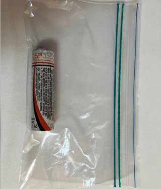 A battery sealed in an individual plastic bag