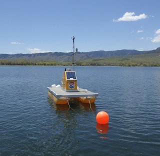Monitoring buoy deployed in a lake.