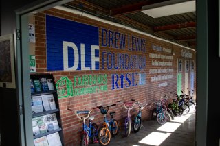 A row of children's bikes line the entryway of the Drew Lewis Foundation at the Fairbanks in Springfield, Missouri. 