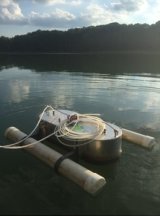 Aluminum floating chamber for measuring diffusive emissions from a reservoir.