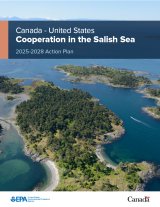 Text overlay with background aerial photo of forested islands on a sunny day.